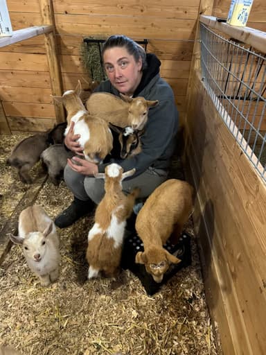 Christine with Nigerian Dwarf kids at RiverHouse Dairy